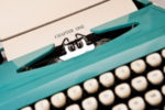 How to Start a Story | typewriter with "chapter one" typed at the top of the page