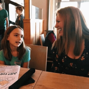 Best Things about 2018. Photo of Bryn Donovan listening as her 10-year-old niece talks.