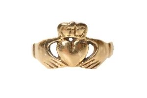 golden claddagh ring symbol showing hands, heart, crown