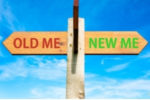 sign with two arrows in opposite directions: "old me" "new me"