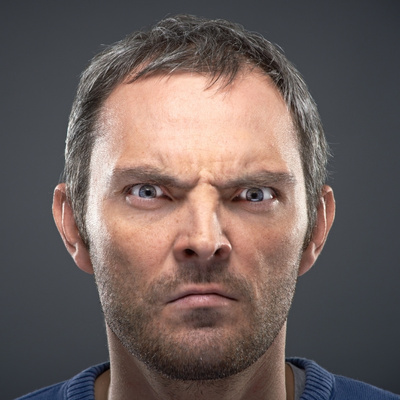 white man with angry expression of fury