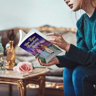 Beautiful Young Woman Reading Her Time Traveling Duke by Bryn Donovan - best romance novels 2025