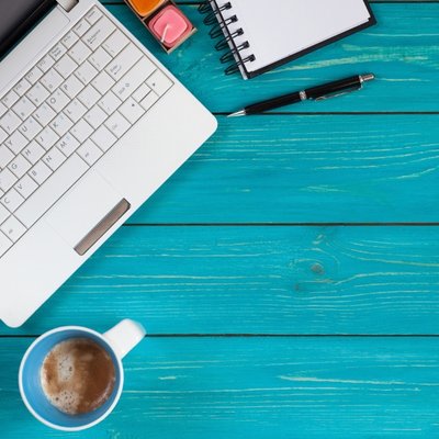laptop coffee notebook writing