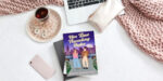 laptop keyboard, tea, and the paperback Her Time Traveling Duke, a romance novel by Bryn Donovan