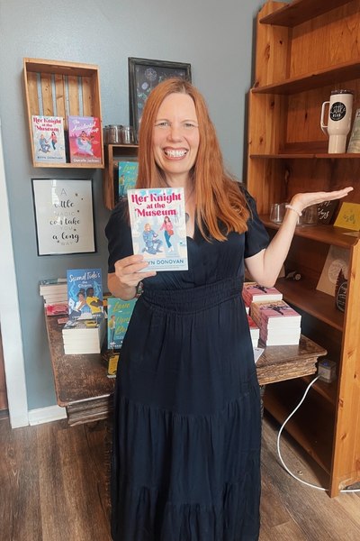 author Bryn Donovan with her novel Her Knight at the Museum