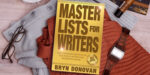 the book Master Lists for Writers Gold Edition, on sweaters, reading classes and a watch nearby