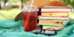 cool drink, blanket, glasses, summer hat, and summer thriller books
