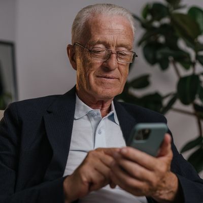 distinguished looking older man on phone