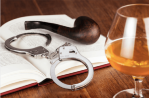 handcuffs, pipe, brandy